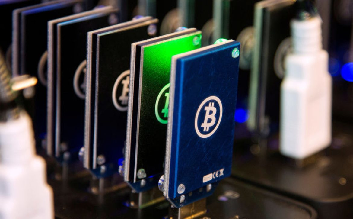 FILE PHOTO: Chain of block erupters used for Bitcoin mining is pictured at the Plug and Play Tech Center in Sunnyvale, California